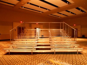 Indoor bleachers with center aisle